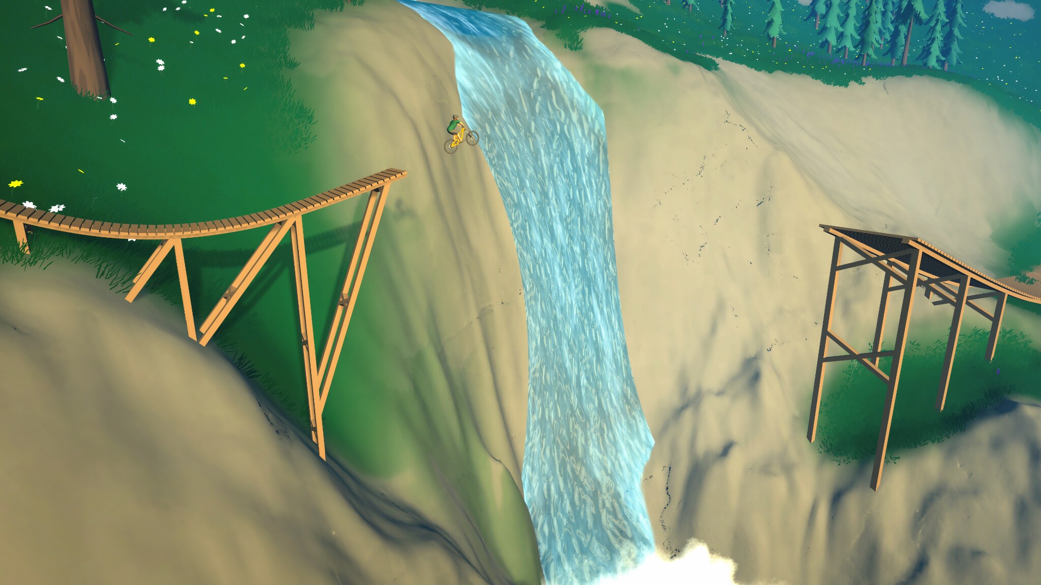 Mountain biker riding a large jump line beside a waterfall