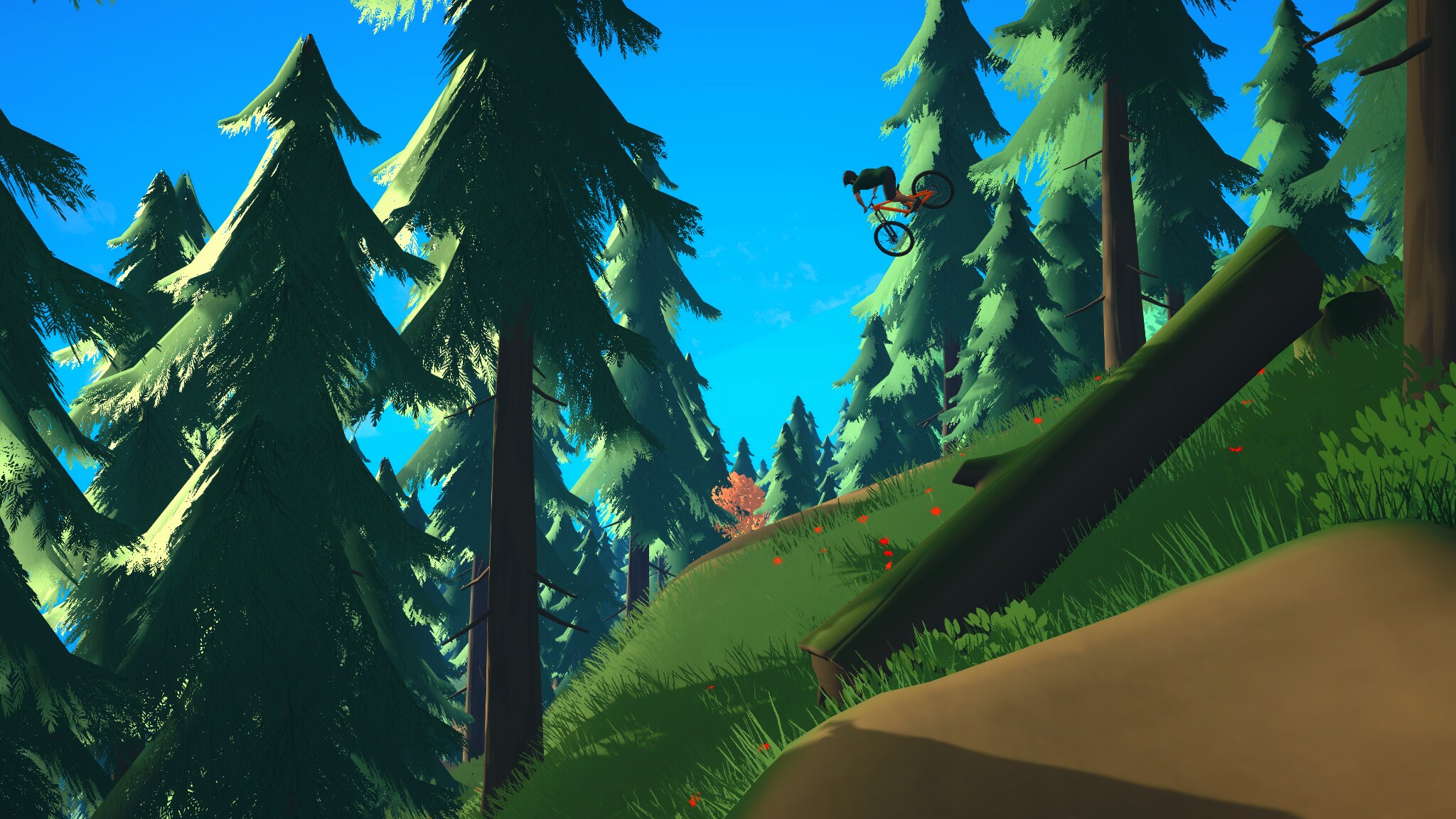 Mountain biker performing a backflip between tall trees